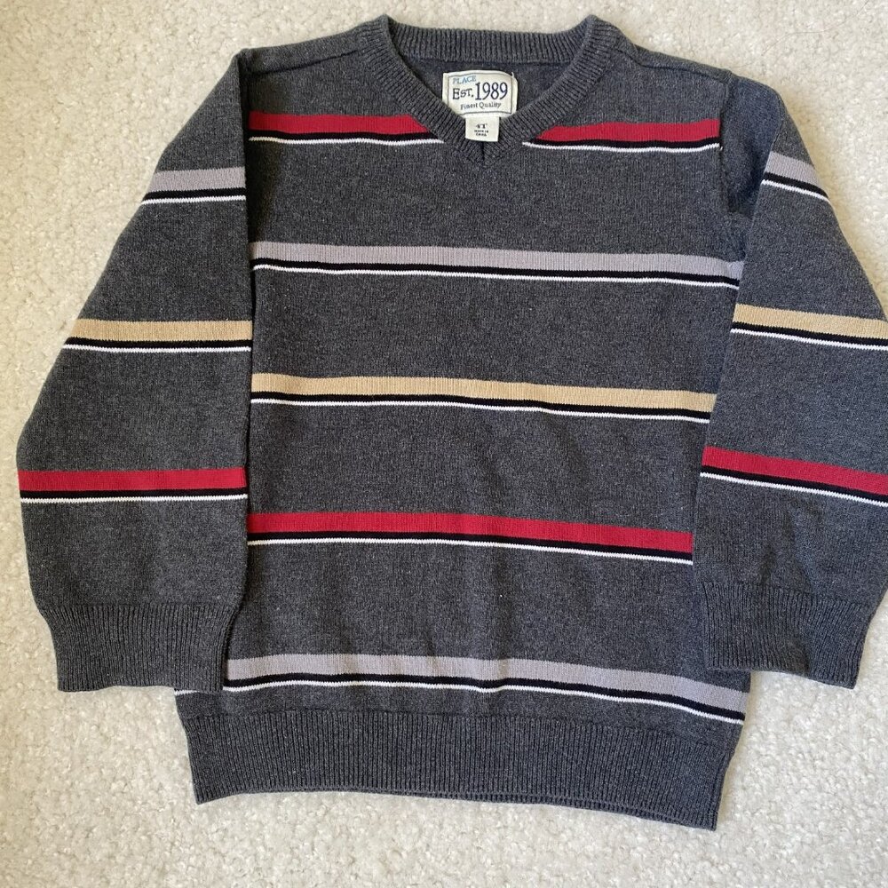 An Est. 1989 Place striped sweater in gray/white/red/black/tan colors